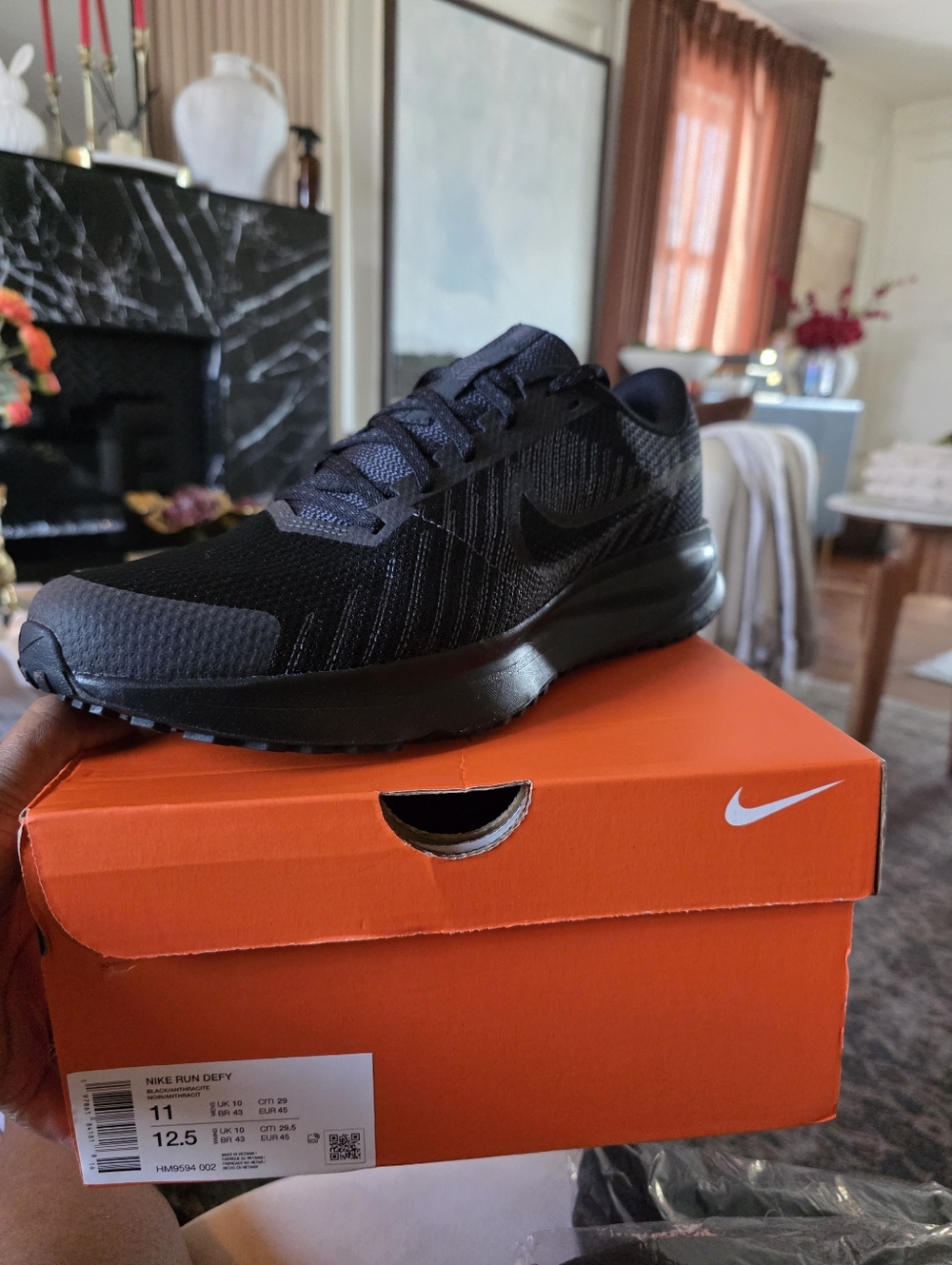 Nike Run Defy: Nike Black Men's Running Trainer with Subtle Textured Upper